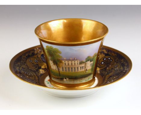 A Chamberlain & Co. Worcester cup and saucer, painted with a view of Frogmore House, against a gilt highlighted cobalt blue g