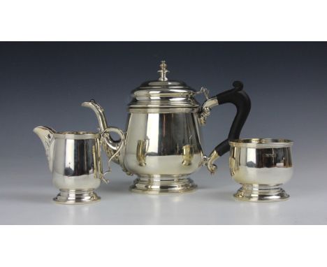A three piece silver tea service, Charles S Green &amp; Co Ltd, Birmingham 1977/76, comprising tea pot, milk jug and sugar bo