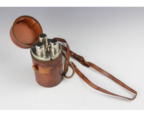 An early 20th century silver-plated three-piece hunting stirrup cup, the three silver plate mounted decanters of triangular s