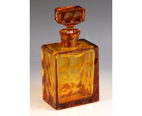 A Czechoslovakian amber glass 'Ice' decanter and stopper by Moser, late 20th century, of dimpled rectangular form, etched mak