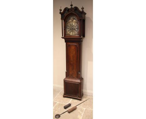 A George III mahogany cased eight day longcase clock by Thomas Brown, Chester, the arched hood with twin swan neck pediment a