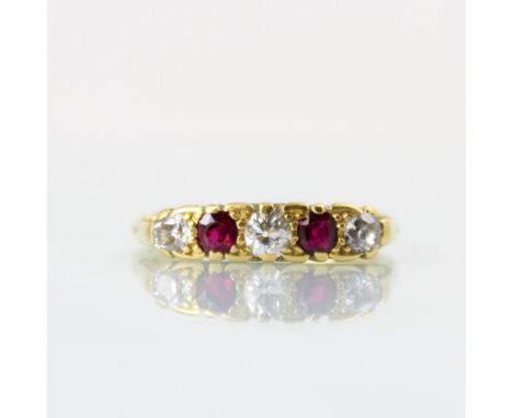 A Victorian style diamond and untested ruby five stone diamond ring, the central old cut diamond with round cut untested ruby