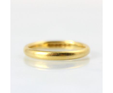 A 22ct yellow gold wedding band, stamped 'HS' Birmingham 1979, ring size K, 3gms 
