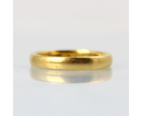 A 22ct yellow gold wedding band, stamped 'WWL' London 1955, ring size L, 3.8gms 