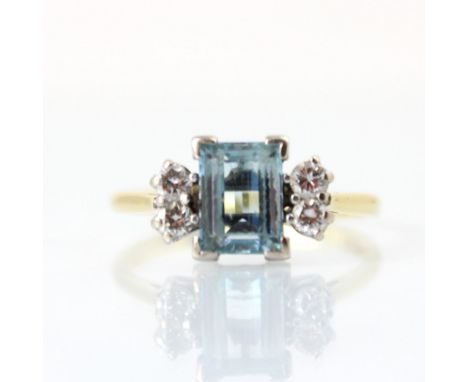 An Edwardian style untested aquamarine and diamond ring, the rectangular cut untested aquamarine with double round cut diamon