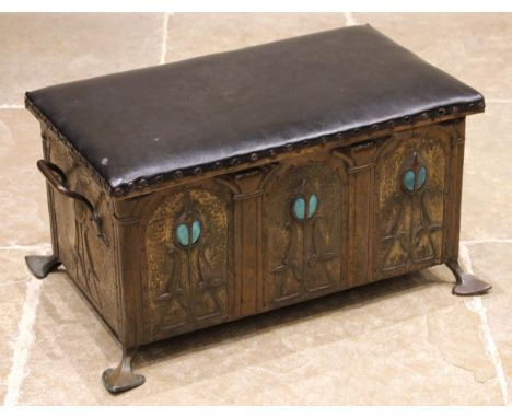 An Arts and Crafts embossed copper covered wooden coal box/stool, in the manner of Archibald Knox, for Liberty, early 20th ce