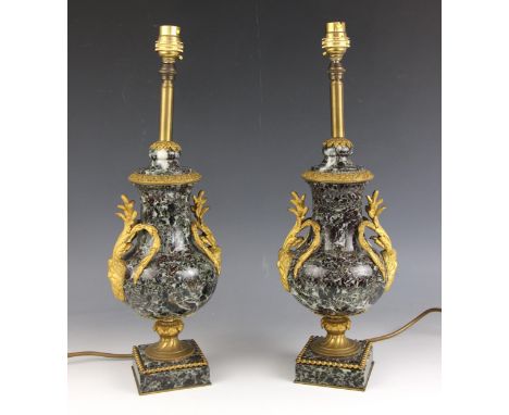 A pair of variegated green marble and ormolu mounted lamp bases, early 20th century, of baluster form applied with ormolu han