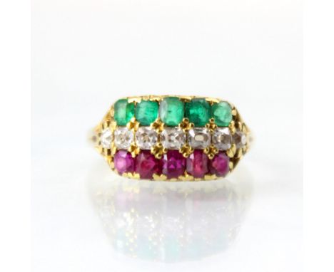 A Victorian untested ruby, diamond and emerald triple row ring, the five mixed cut untested emeralds above a row of seven mix