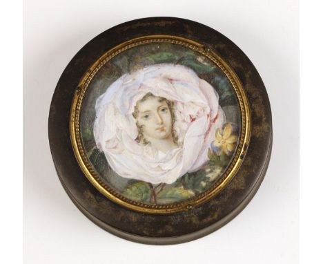 A 19th century tortoiseshell portrait miniature inset snuff box, the circular box with removable cover set with a tondeau por