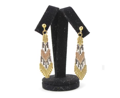 A pair of gold coloured mesh work earrings, the tri coloured arrow shaped earrings with textured and plain polished detail, w