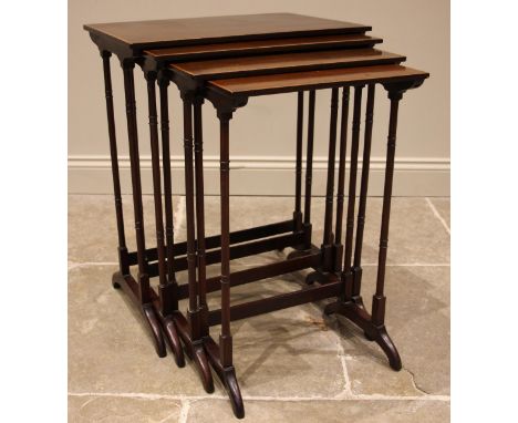 A quartetto of mahogany and satinwood banded tea tables, by Thomas Turner, late 19th/early 20th century, each upon slender ri