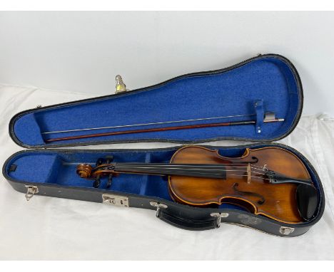 A vintage Â¾ sized violin with bow, in blue felt lined hard carry case. In good condition, vendor advises it was recently ref