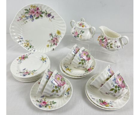 A Royal Doulton "Arcadia" pattern (HN4802) 6 setting tea set. Comprising: 6 cups &amp; saucers, 6 x 6Â½" tea plates, 2 handle