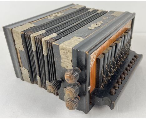 A vintage Monogramm concertina. Marked "Fabrik Marke Made In Saxony". 