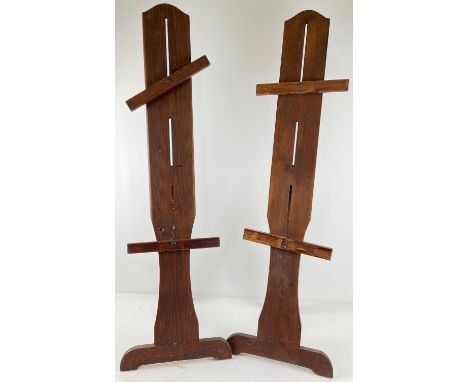2 wooden easel style display stands with folding foot/stand. With height adjustable supports. Each approx. 115cm tall. 