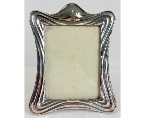 A large Art Nouveau silver fronted picture frame of stylised sinuous design. Hallmarked for Birmingham 1905 and with E Mander