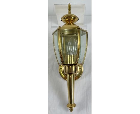 A modern brass replica wall mountable hexagonal coach lantern with clear glass panels. By Holtkotter, in original box, as pur