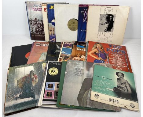 A collection of mixed genre vintage LP records mostly easy listening and classical. To include The Eagles, Simon &amp; Garfun