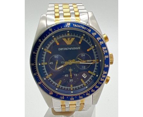 A men's AR-6088 chronograph wristwatch by Emporio Armani. Duo coloured stainless steel strap and case. Blue face with gold to