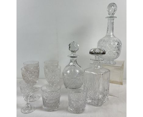 3 vintage cut crystal decanters with stoppers. To include Bulbous decanter together with 7 assorted matching glasses by Tudor