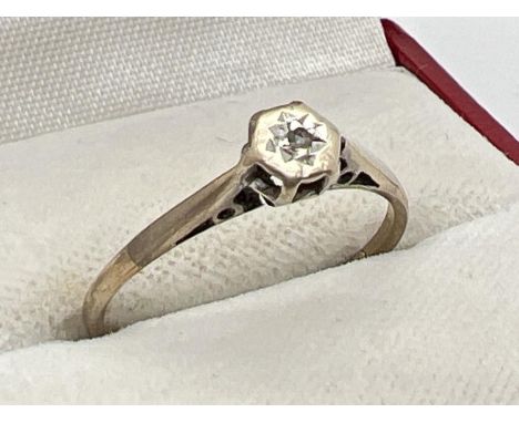 A vintage 9ct gold illusion set diamond solitaire style ring. Hallmarked inside band. Mount needs attention. Ring size O. Tot