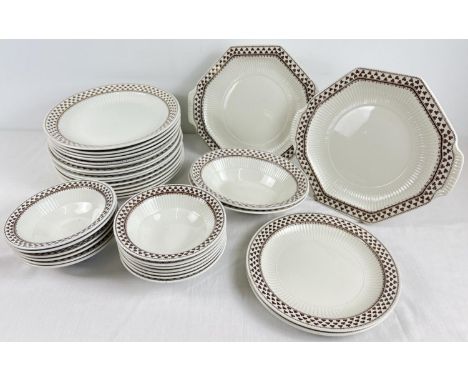 A collection of Adams dinner ware in "Sharon" brown shamrock pattern. Comprising: 17 plates, 2 octagonal serving plates, 13 b