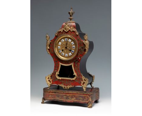 Boulle style clock; France, Napoleon III period, second half of the 19th century.Bronze and ebonised wood.Movement Paris Japy