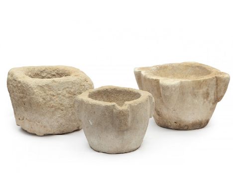 Set of three stone mortars.Spain, late 17th - early 18th century.Sizes: 15 x 22 x 28 cm, 16 x 26 x 26 cm, 17 x 29 x 29 cm (re