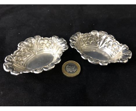 Pair embossed H M Silver Dishes - a pair of oval dishes with fish scale and harebell etc.London 1897, maker Robert Pringle &a