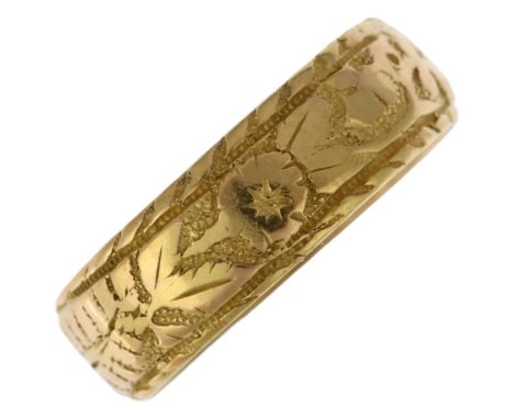 A 19th century 18ct gold wedding band ring, maker EDW, Birmingham 1888, chased and engraved floral and fern decoration, band 