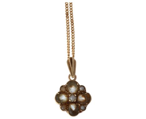 A 9ct gold gem set flowerhead pendant necklace, on 9ct fine curb link chain, pendant 21.8mm, chain 46cm, 4gNo damage or repai
