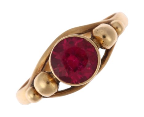 A late 20th century Middle Eastern synthetic ruby ring, apparently unmarked, setting height 7.1mm, size M, 1.9gNo damage or r