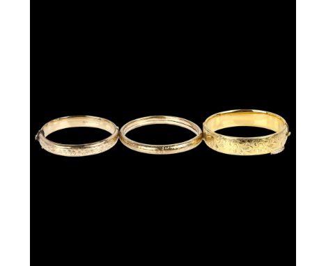 3 rolled gold hinged bangles, largest internal circumference 18cm, 68.4g total (3)No damage or repair, only light surface wea
