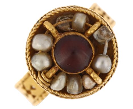 An early Medieval Byzantine Ecclesiastical gold red spinel and pearl bishop's ring, circa 600-800 AD, the cruciform pierced t