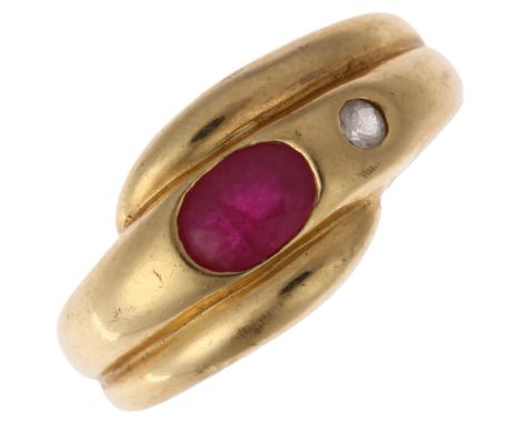 A 14ct gold ruby and white sapphire crossover ring, maker WHS, rub-over set with oval mixed-cut ruby and round-cut white sapp