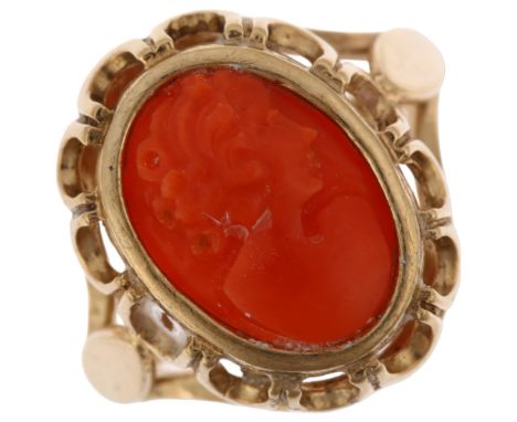 A modern 9ct gold coral cameo ring, maker GVA, relief carved depicting female profile, setting height 17.9mm, size N, 3.5gNo 