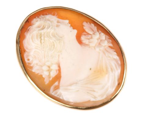 A large mid-20th century shell cameo ring, relief carved depicting Art Nouveau female profile, apparently unmarked gold setti