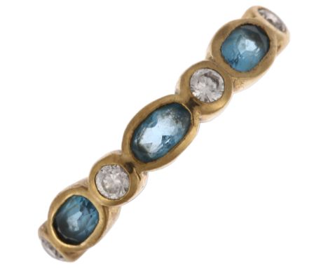 A modern 9ct gold blue topaz and diamond half eternity ring, setting height 4.45mm, size V, 3.2gNo damage or repair, all ston