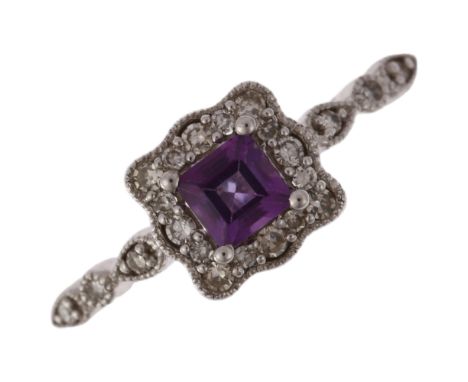 A modern 9ct white gold amethyst and diamond square cluster ring, total diamond content approx 0.12ct, setting height 7mm, si