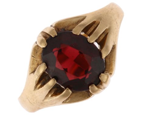 A mid-20th century 9ct gold garnet gypsy ring, maker A&Co, London 1967, claw set with oval mixed-cut garnet, setting height 1