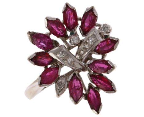 An 18ct white gold ruby and diamond cocktail ring, set with marquise-cut rubies and single-cut diamonds, setting height 19.7m