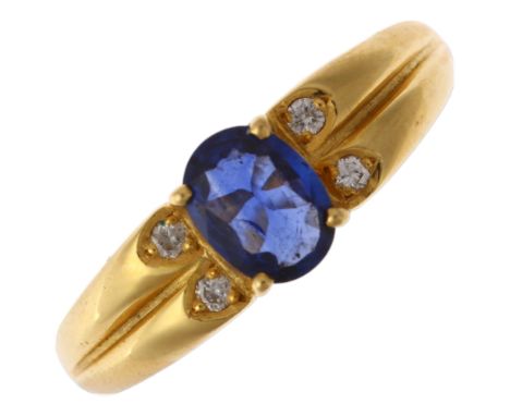 An 18ct gold Ceylon sapphire and diamond dress ring, claw set with 0.5ct oval mixed-cut sapphire and modern round brilliant-c