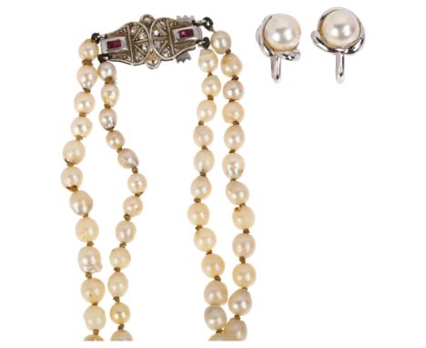 A late 20th century cultured pearl necklace and earring set, comprising double-strand necklace with 9ct white gold ruby clasp