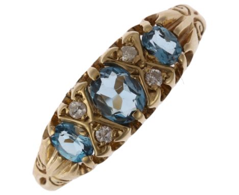 A 9ct gold blue seven stone blue topaz and diamond half hoop ring, setting height 6.4mm, size O, 2gNo damage or repair, all s