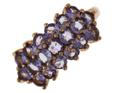 A modern 9ct gold tanzanite triple-row half hoop ring, maker QVC, Birmingham 1999, claw set with round-cut tanzanites, settin