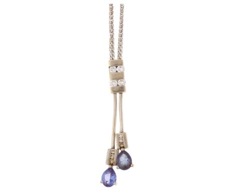 A modern 18ct white gold tanzanite and diamond negligee pendant necklace, claw set with pear-cut tanzanites and modern round 