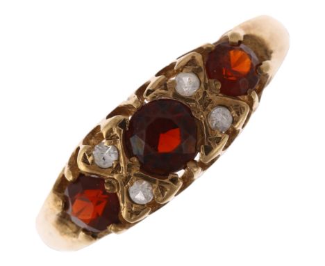 A mid-20th century 9ct gold seven stone garnet and white sapphire half hoop ring, maker PDL, Birmingham 1969, setting height 