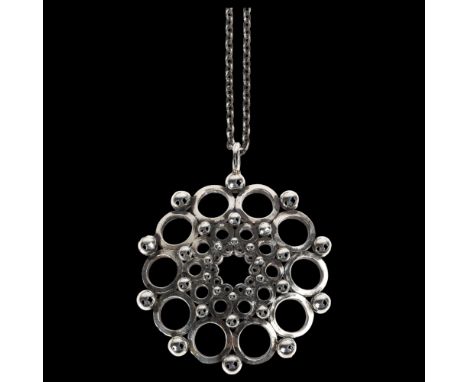 KALEVALA KORU - a Finnish modernist sterling silver openwork flowerhead pendant necklace, circa 1979, on sterling cable link 