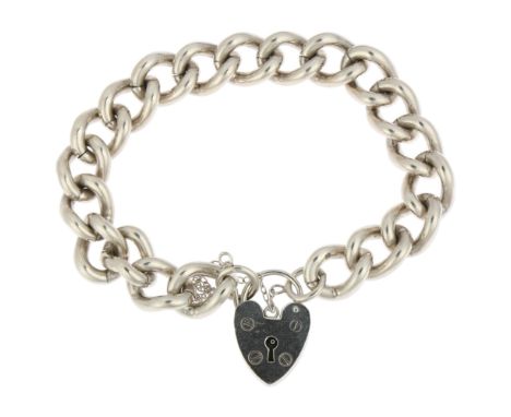 A heavy late 20th century silver solid curb link chain bracelet, maker CB Ltd, Birmingham 1978, with silver heart padlock cla