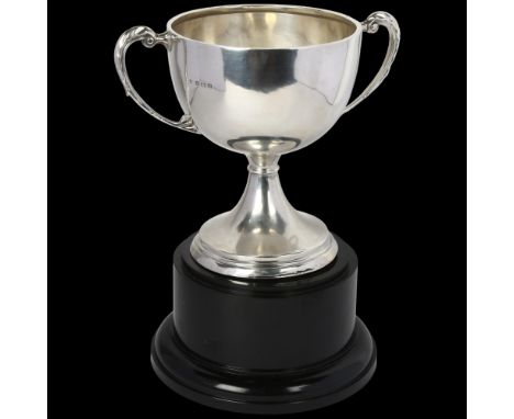 An Art Deco George V silver 2-handled trophy cup on stand, indistinct maker, Birmingham 1934, overall 25cm, weighted baseTrop